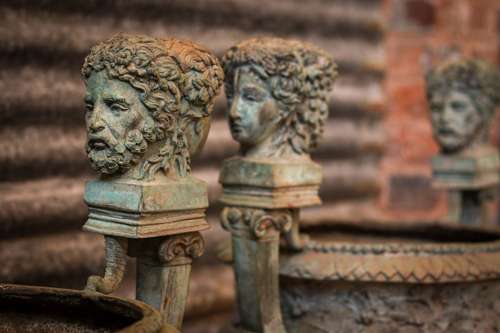 A Pair Of Substantial Bronze Urns