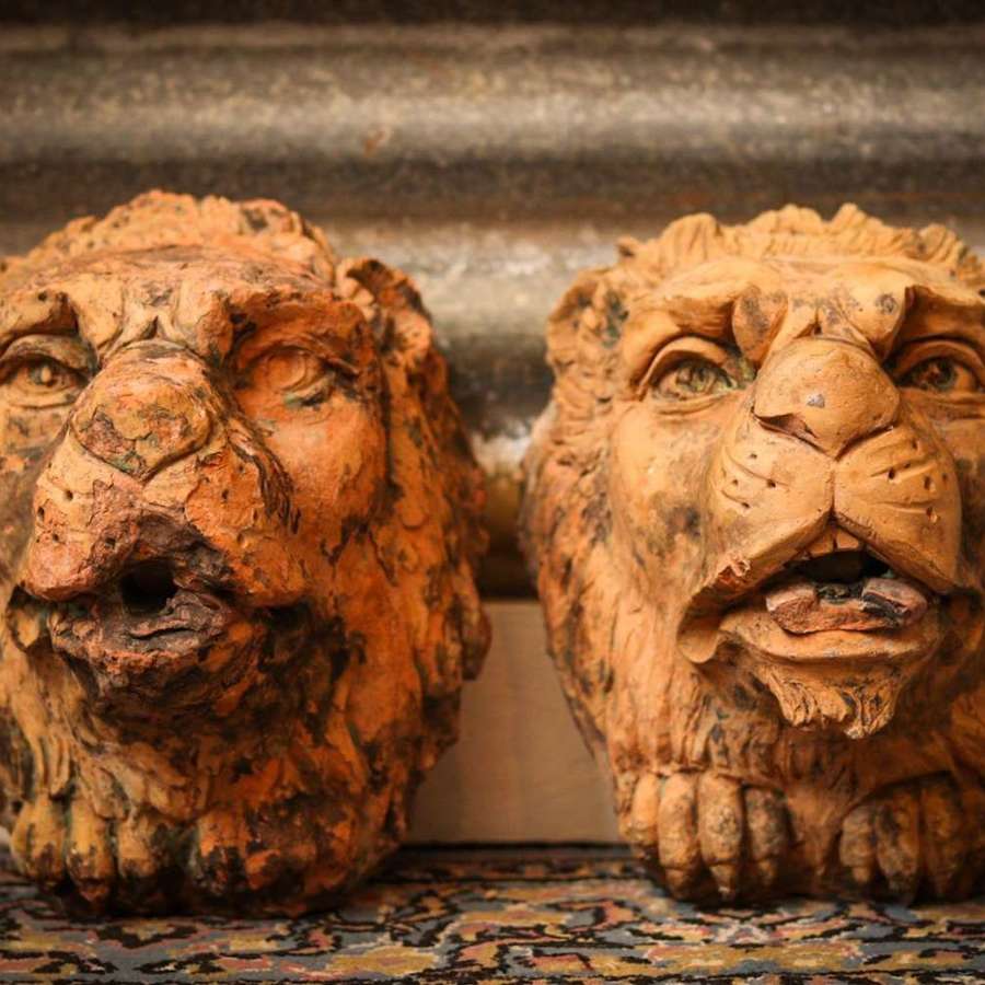 Pair of salvaged 19th Century Terracotta Spanish Lion Mask Heads